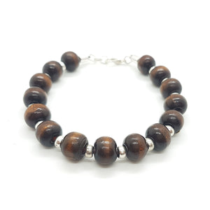 Pulsera bolitas de madera y zamak