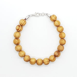 Pulsera bolitas de madera y zamak