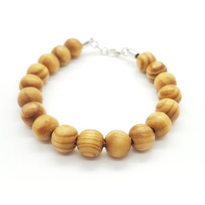 Pulsera bolitas de madera y zamak