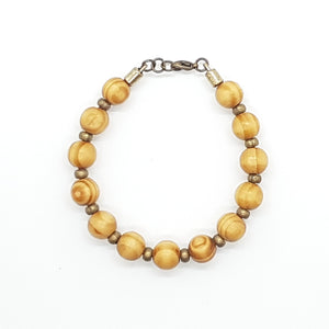 Pulsera bolitas de madera y zamak