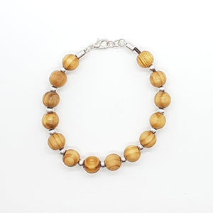 Pulsera bolitas de madera y zamak