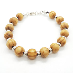 Pulsera bolitas de madera y zamak