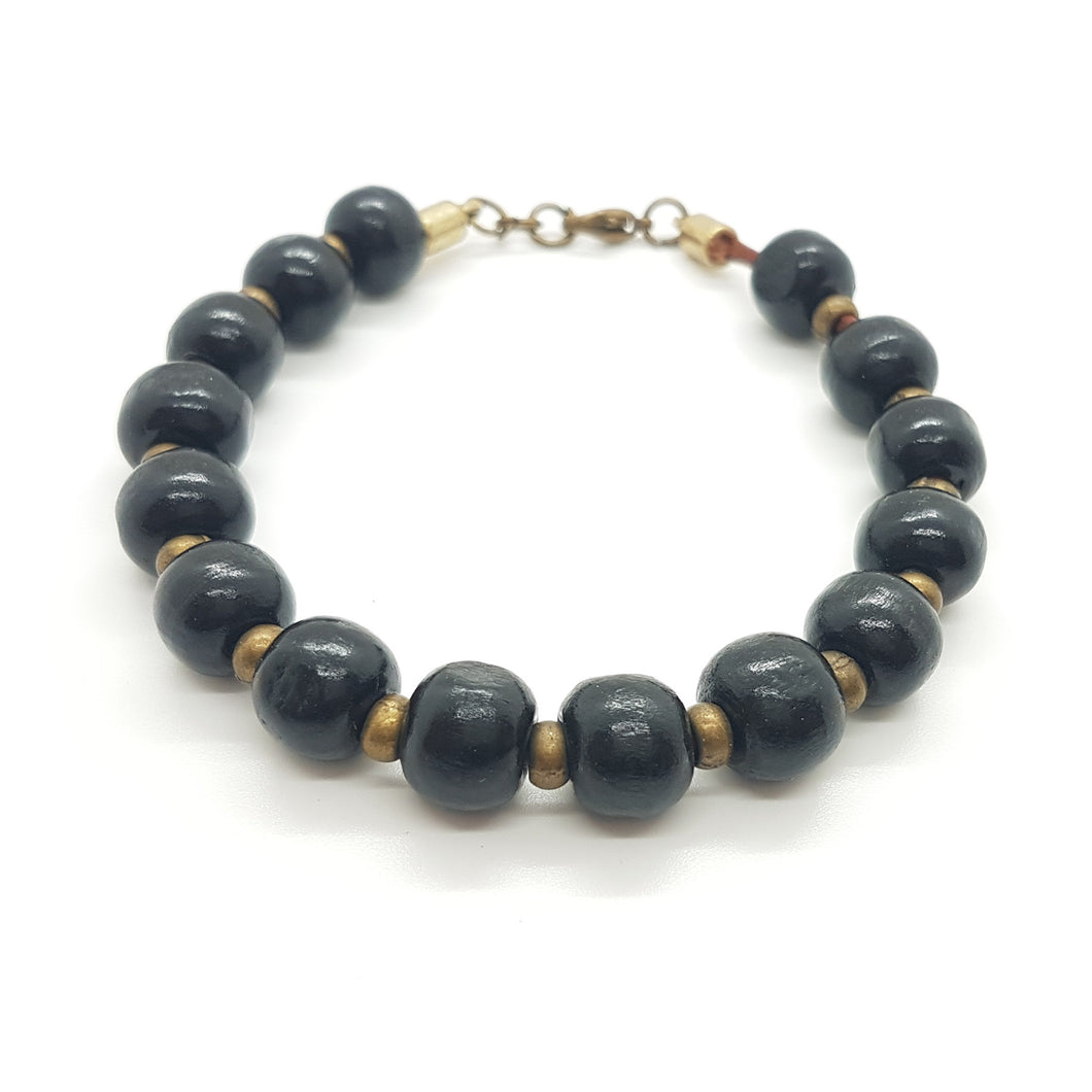 Pulsera bolitas de madera y zamak